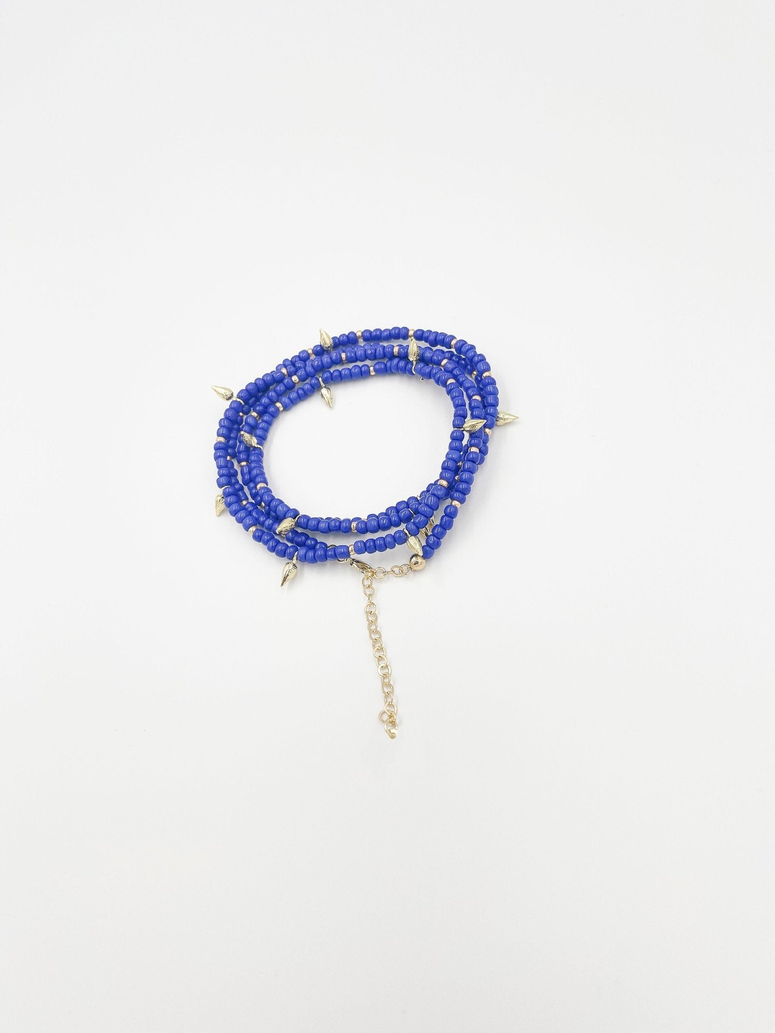 Beads necklace featuring 18 karat gold plated ornaments that can be styled as a bracelet or belt. - ELLY