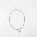 18 karat gold plated necklace featuring beads and a striking Japanese pearl pendant - ELLY