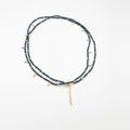 Beads necklace featuring 18 karat gold plated ornaments that can be styled as a bracelet or belt. - ELLY
