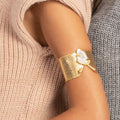 Handmade bracelet 18K gold-plated brass with a beautifully hammered martelé finish and featuring stunning baroque stones