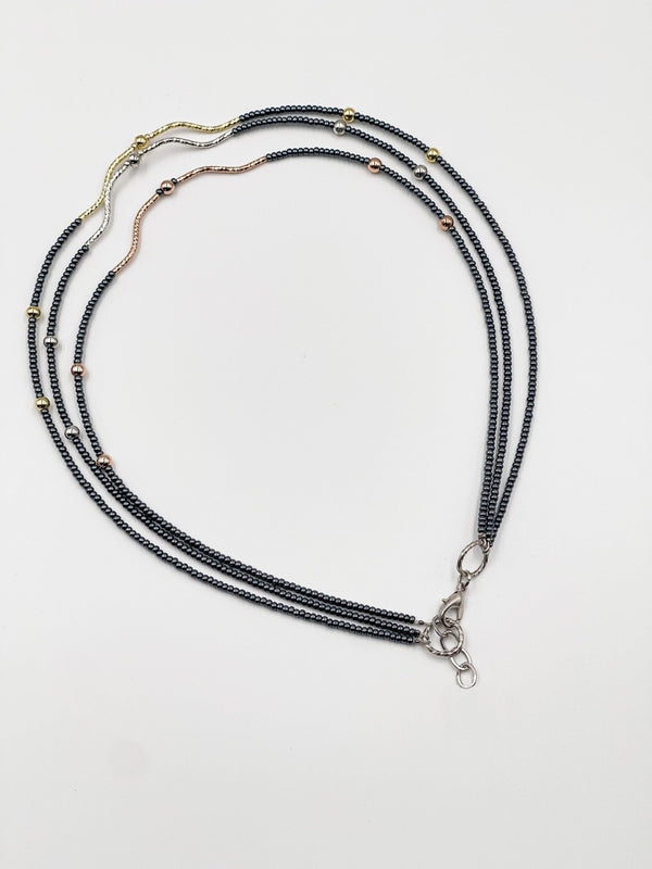 Hematite beads necklace featuring rhodium-coated metal in three elegant colors - ELLY